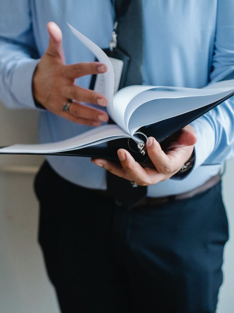 businessman reading documents in office